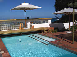 Backpackers Beach House Lodge 4 star backpackers accommodation in Plettenberg Bay is literally seven steps from the beach 